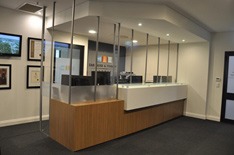 Custom built perspex screen for reception desk